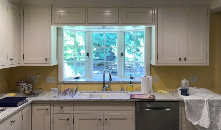services-Slideshow-Johnson-Construction-Billings-Kitchen-Remodel-White-Cabinets-Sink-Window-Marble-Countertops